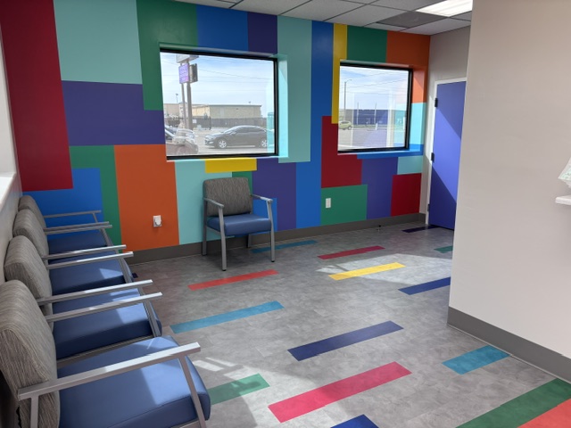 Colorful children's waiting area at Dynamic Healthcare Stat Care in Clovis, NM